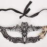 Кружевная маска в венецианском стиле с многочисленными узорами