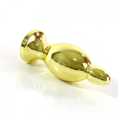 Анальный стимулятор золотого цвета со стразой в основании