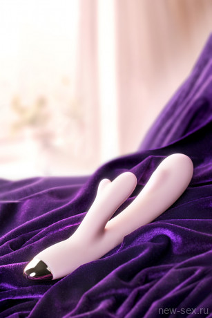 Нежно-розовый вибратор с отростком для стимуляции клитора MERYL