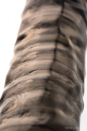 Реалистичная увеличивающая насадка на пенис с рельефной поверхностью плюс 7 см XLover 