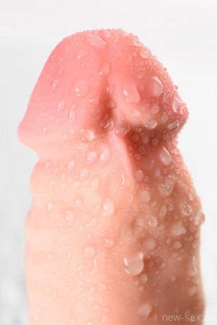 Реалистичный фаллоимитатор с рельефной поверхностью и мошонкой RealStick Elite DILDO