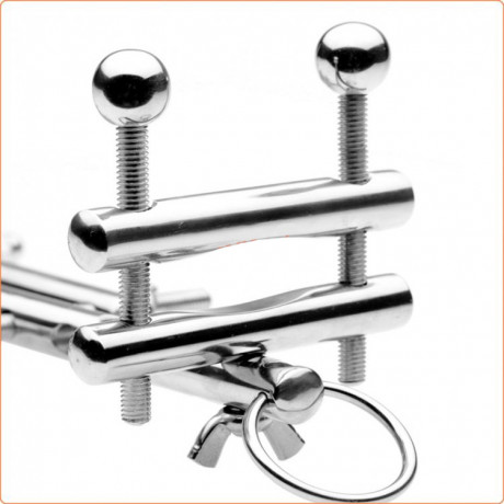 Устройство растягивания мошонки с анальной пробкой