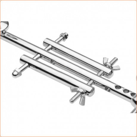 Устройство растягивания мошонки с анальной пробкой